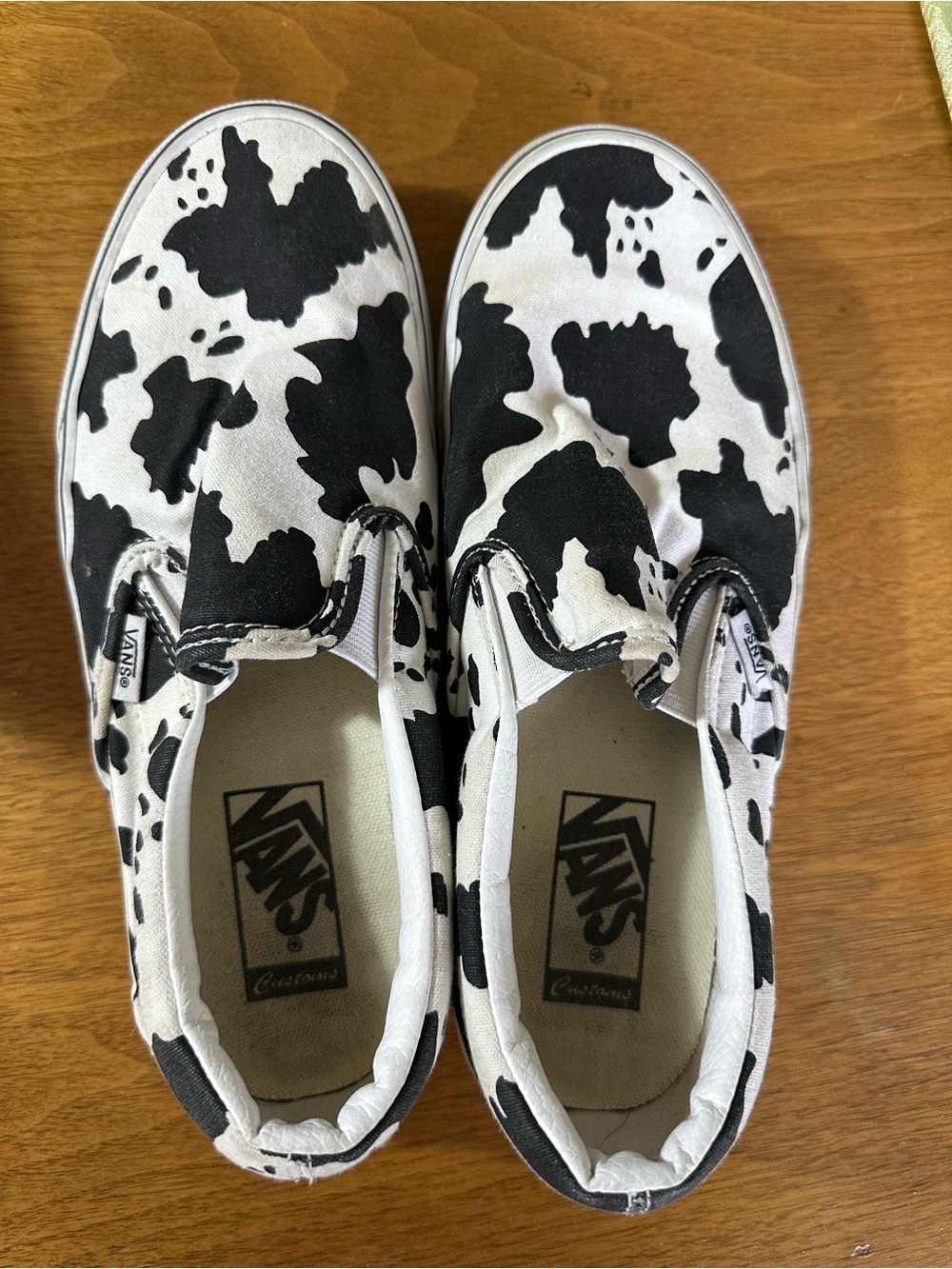 Vans Black & White Cow-Print Slip-On Sneakers
